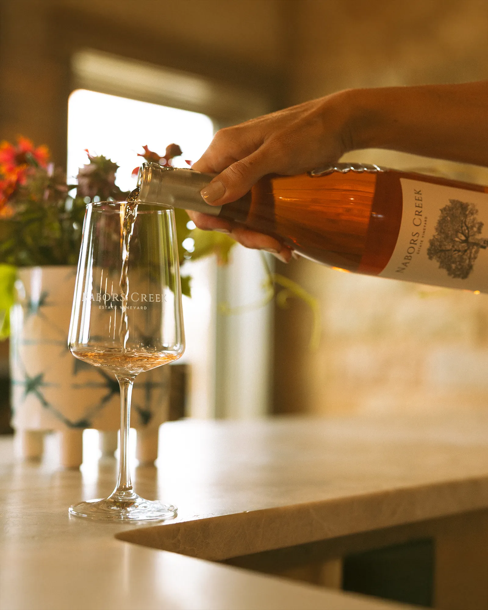 Nabors creek wine being poured into a glass