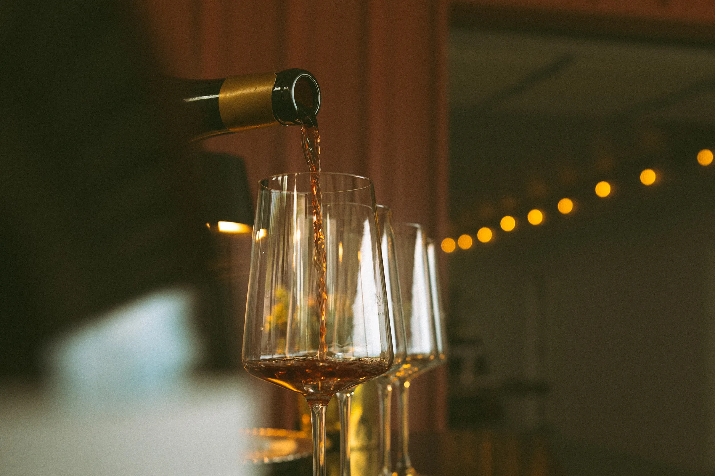 Nabors Creek wine being poured in to a glass at a private event.