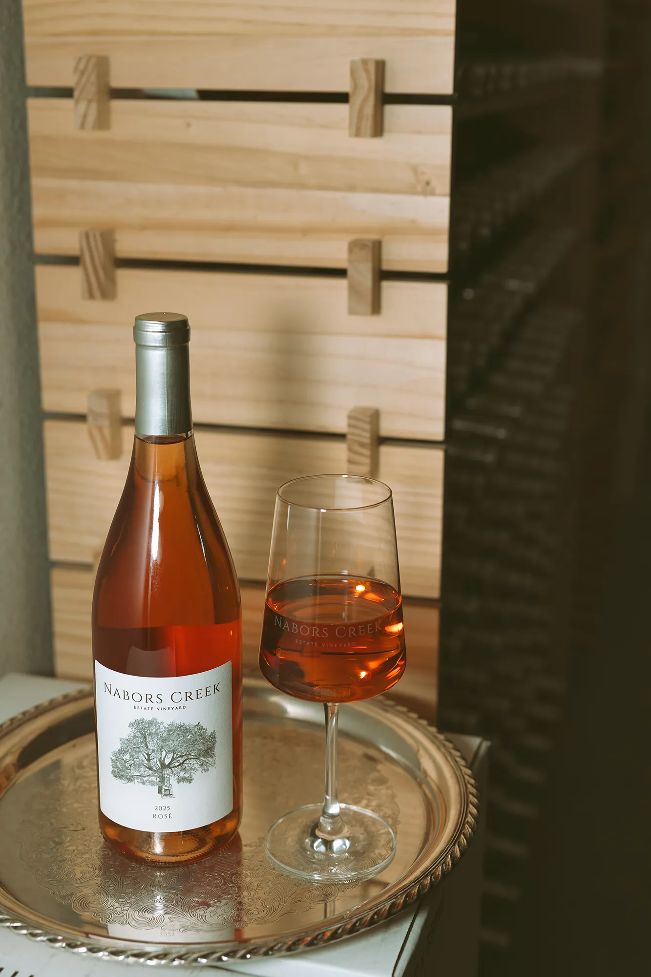 Nabors Creek wine bottle and glass